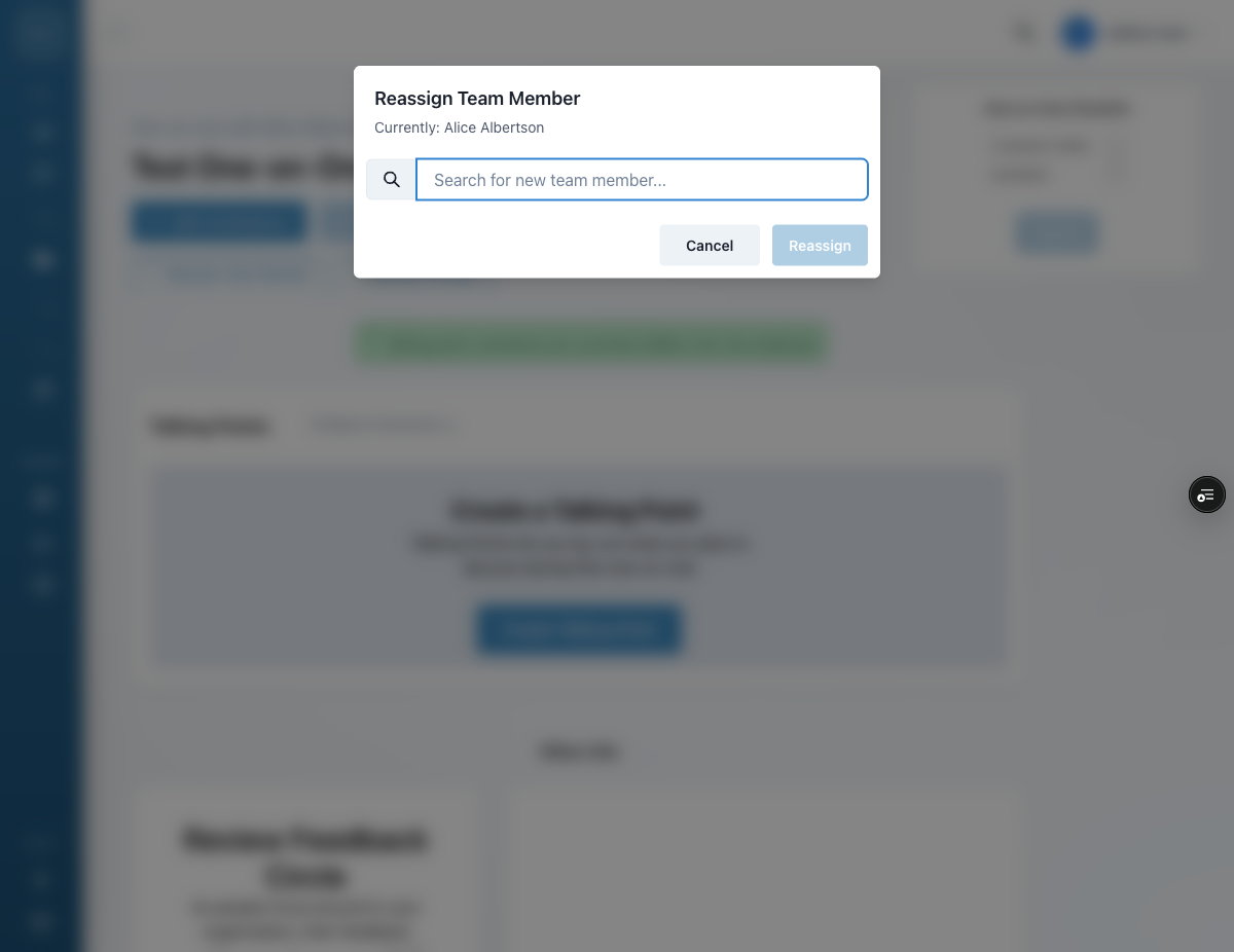 Reassign Team Member modal showing current assignment and search input